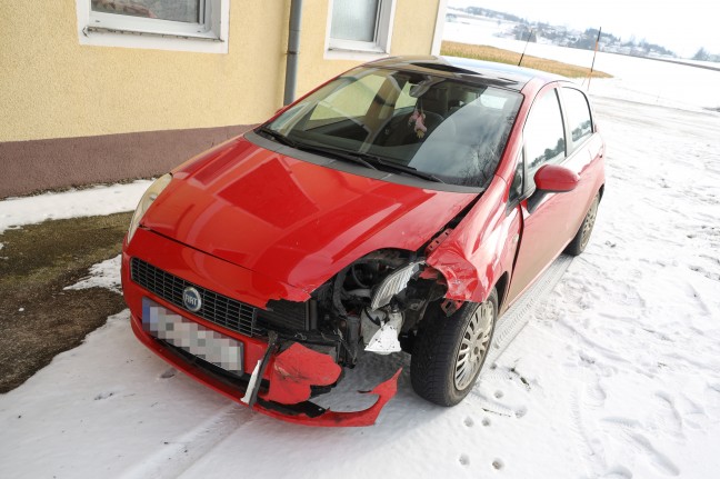 Two cars collide in a slippery corner in Logirchen