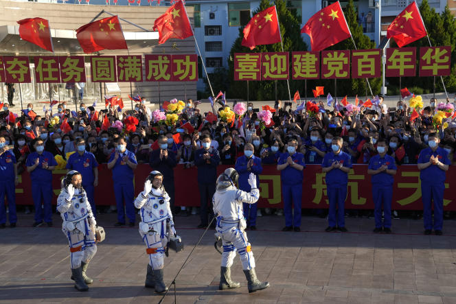Chinese astronauts Tang Hongbo, Liu Booming and Ni Heisheng before the Long-March 2F rocket takes off in Juan on June 17, 2021.