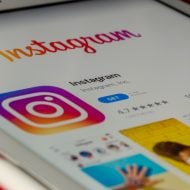An iPhone has been opened for the Instagram app in the App Store.
